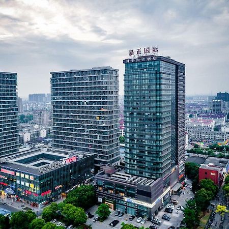 Jiazheng International Energy Hotel Huaqiao  Экстерьер фото